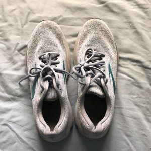 Grey and teal Brooks running shoes